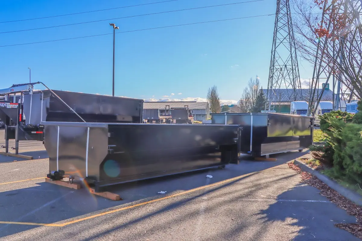 Roll-off dumpster ready for waste disposal at job site for Concrete Dumpster Rental in Minnetonka